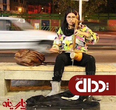 عکس/ دختر نوازنده در خیابان ولی عصر