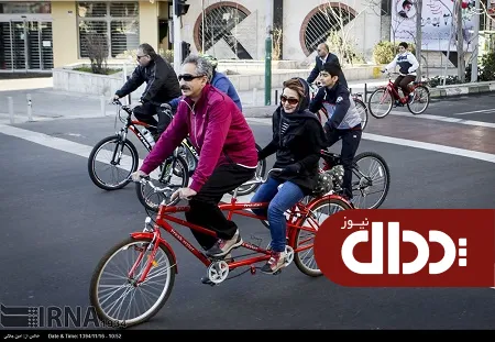عکس/ دوچرخه دونفره در خیابان‌های تهران